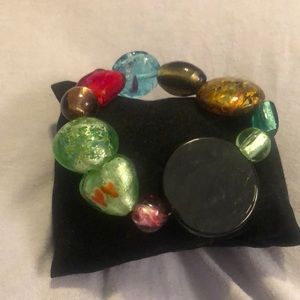 Multicolored smooth glass bead bracelet.